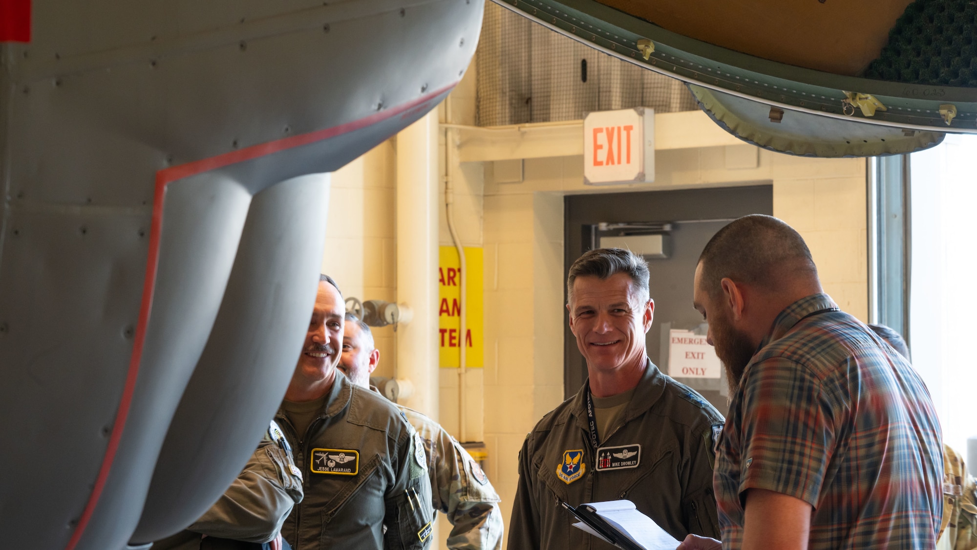 Airmen listen to a B-52H Stratofortress briefing.