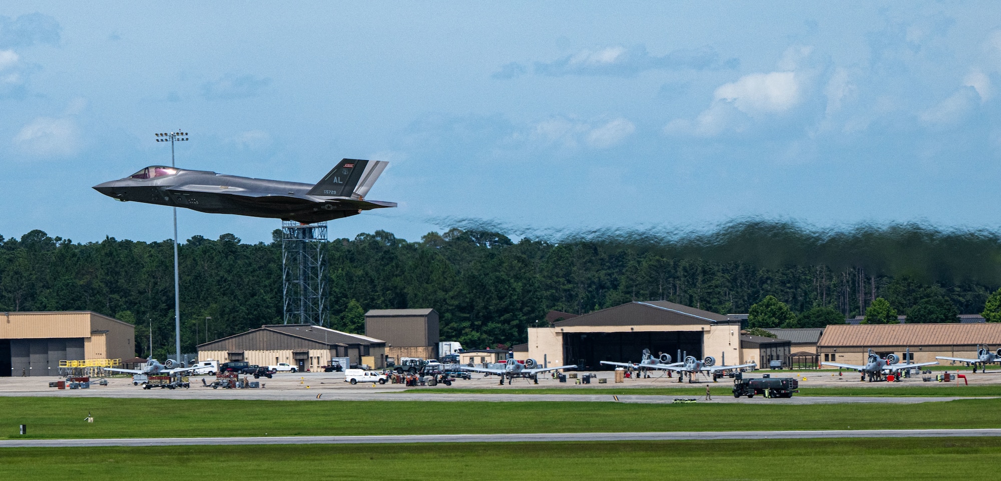A U.S. Air Force F-35A Lightning II from the 187th Fighter Wing flies at low-level during a comprehensive noise exercise at Moody Air Force Base, Georgia, June 18, 2025. The evaluation focused on the impact of the F-35's acoustic signature on local wildlife populations and nearby residential areas. (U.S. Air Force photo by 1st Lt. Benjamin Williams)
