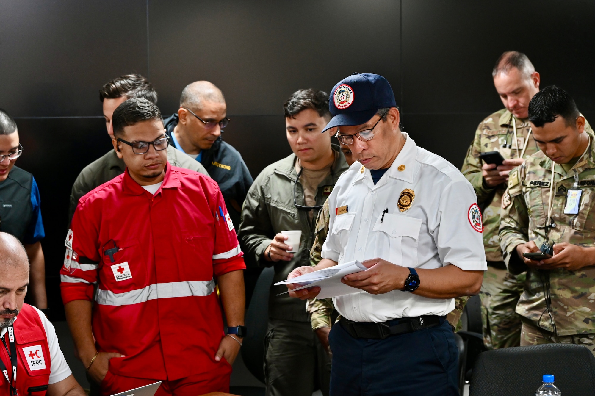 emergency management person from Panama leads a group discussion in exercise scenario planning