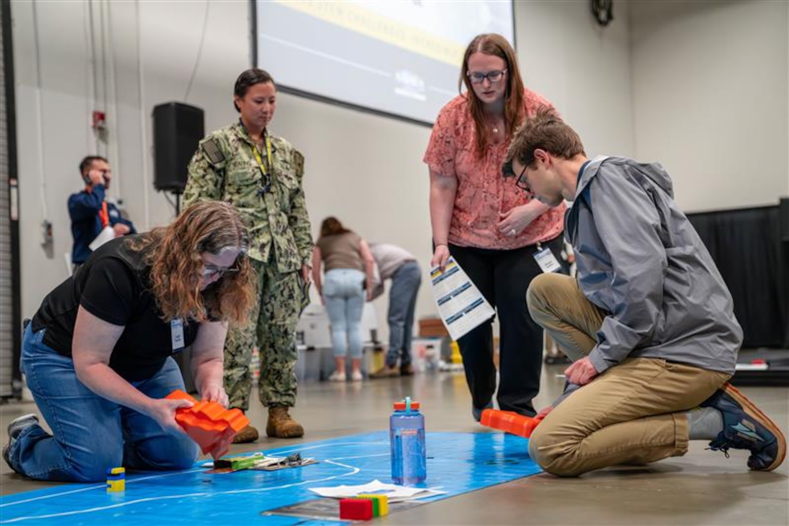 FREDERICKSBURG, Va. – Engineers and scientists at the Naval Surface Warfare Center Dahlgren Division (NSWCDD) designed and organized the first STEM Triad event at the Fredericksburg Convention Center in Virginia. These subject matter experts served as dedicated STEM mentors, encouraging the next generation of students to pursue careers in STEM. (Dorina Watermolen/NSWCDD photo)