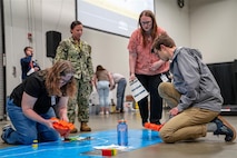 FREDERICKSBURG, Va. – Engineers and scientists at the Naval Surface Warfare Center Dahlgren Division (NSWCDD) designed and organized the first STEM Triad event at the Fredericksburg Convention Center in Virginia. These subject matter experts served as dedicated STEM mentors, encouraging the next generation of students to pursue careers in STEM. (Dorina Watermolen/NSWCDD photo)