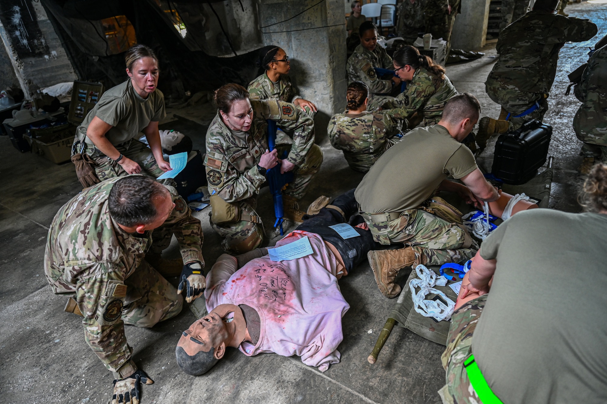 U.S. Airmen with the 445th Aeromedical Staging Squadron from Wright-Patterson Air Force Base, Ohio, and 944th ASTS from Luke AFB, Ariz., provide medical care to simulated casualties during Tactical Combat Casualty Care training for Exercise Relentless Valor at WSU’s Calamityville, Fairborn, Ohio, June 6, 2025. Calamityville is a training, testing and research venue where military and civilian emergency first responders hone their skills while building relationships. The exercise was designed to enhance the joint force’s ability to maneuver and conduct missions in contested, degraded and operationally limited environments. (U.S. Air Force photo by Master Sgt. Patrick OReilly)