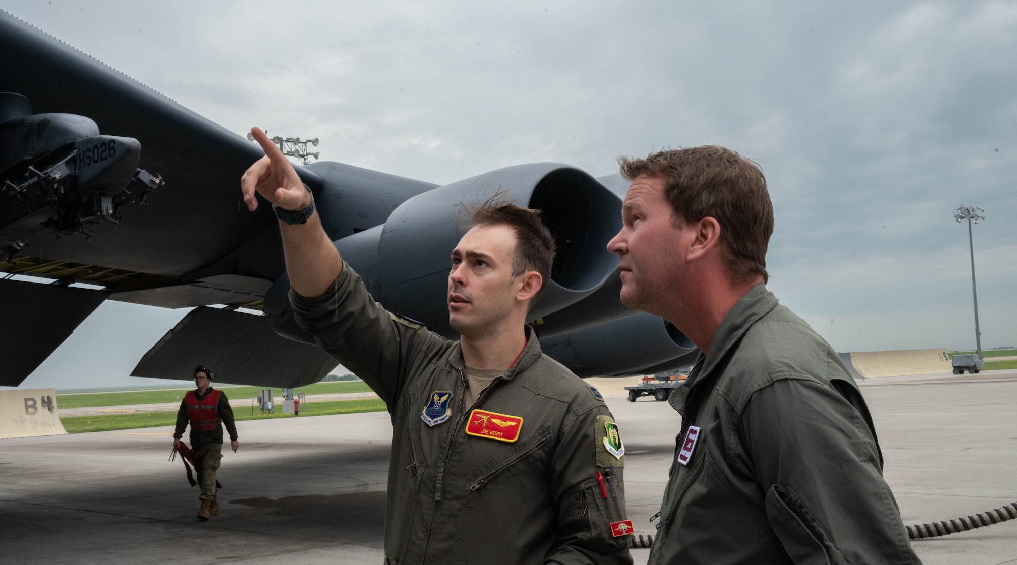 Ryan Ackerman, 91st Missile Wing honorary commander (right), and U.S. Air Force Capt. Charles Berry, a 23rd Bomb Squadron B-52H Stratofortress pilot (left), perform a pre-flight check for an orientation flight at Minot Air Force Base, North Dakota, June 24, 2025. Prior to any flight, the aircrew perform pre-flight checks to ensure that the aircraft is prepared for flight and can safely take off. (U.S. Air Force photo by Airman 1st Class Wesley Davies)