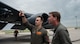 Ryan Ackerman, 91st Missile Wing honorary commander (right), and U.S. Air Force Capt. Charles Berry, a 23rd Bomb Squadron B-52H Stratofortress pilot (left), perform a pre-flight check for an orientation flight at Minot Air Force Base, North Dakota, June 24, 2025. Prior to any flight, the aircrew perform pre-flight checks to ensure that the aircraft is prepared for flight and can safely take off. (U.S. Air Force photo by Airman 1st Class Wesley Davies)