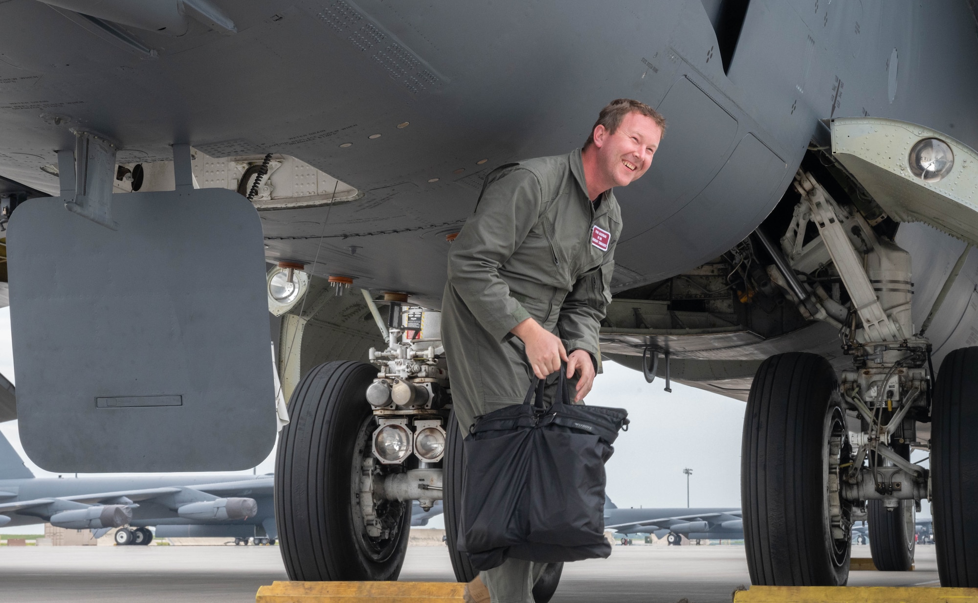Ryan Ackerman, 91st Missile Wing (91MW) honorary commander, steps down from a B-52H Stratofortress after an orientation flight at Minot Air Force Base, North Dakota, June 24, 2025. As a Task Force 21 civic leader and 91MW honorary commander, Ackerman works with the base to help strengthen connections between the base and the public. (U.S. Air Force photo by Airman 1st Class Wesley Davies)