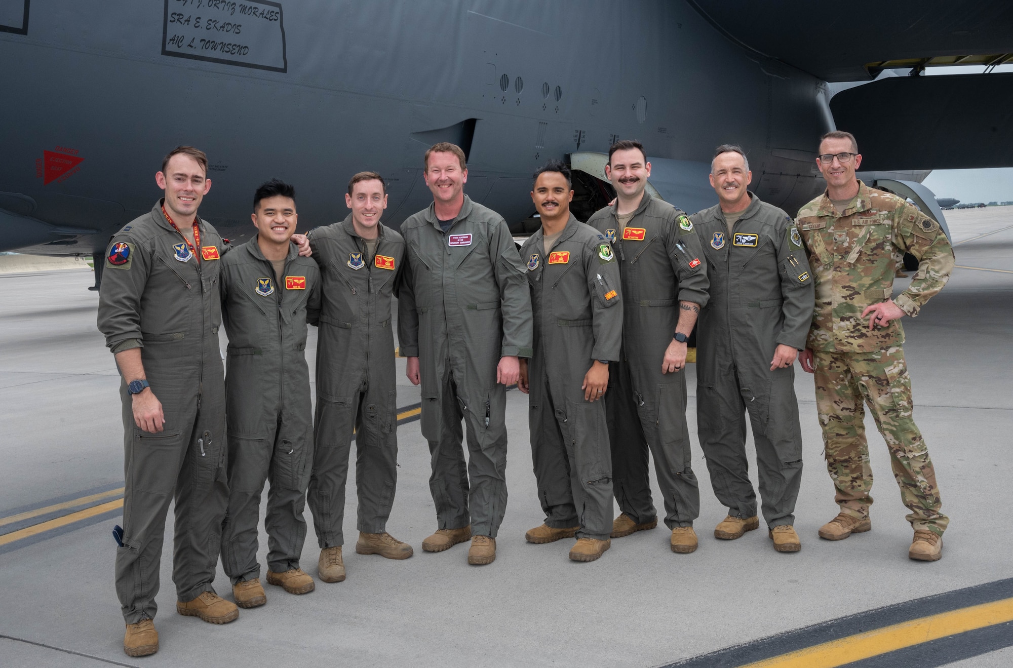 Ryan Ackerman, 91st Missile Wing honorary commander (fourth from left), poses for a photo with 5th Bomb Wing (5BW) leadership and 23rd Bomb Squadron flight crew after an orientation flight at Minot Air Force Base, North Dakota, June 24, 2025. The aircrew took Ackerman on an orientation flight to help give a better idea of the 5BW’s mission and capabilities. (U.S. Air Force photo by Airman 1st Class Wesley Davies)