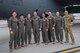 Ryan Ackerman, 91st Missile Wing honorary commander (fourth from left), poses for a photo with 5th Bomb Wing (5BW) leadership and 23rd Bomb Squadron flight crew after an orientation flight at Minot Air Force Base, North Dakota, June 24, 2025. The aircrew took Ackerman on an orientation flight to help give a better idea of the 5BW’s mission and capabilities. (U.S. Air Force photo by Airman 1st Class Wesley Davies)