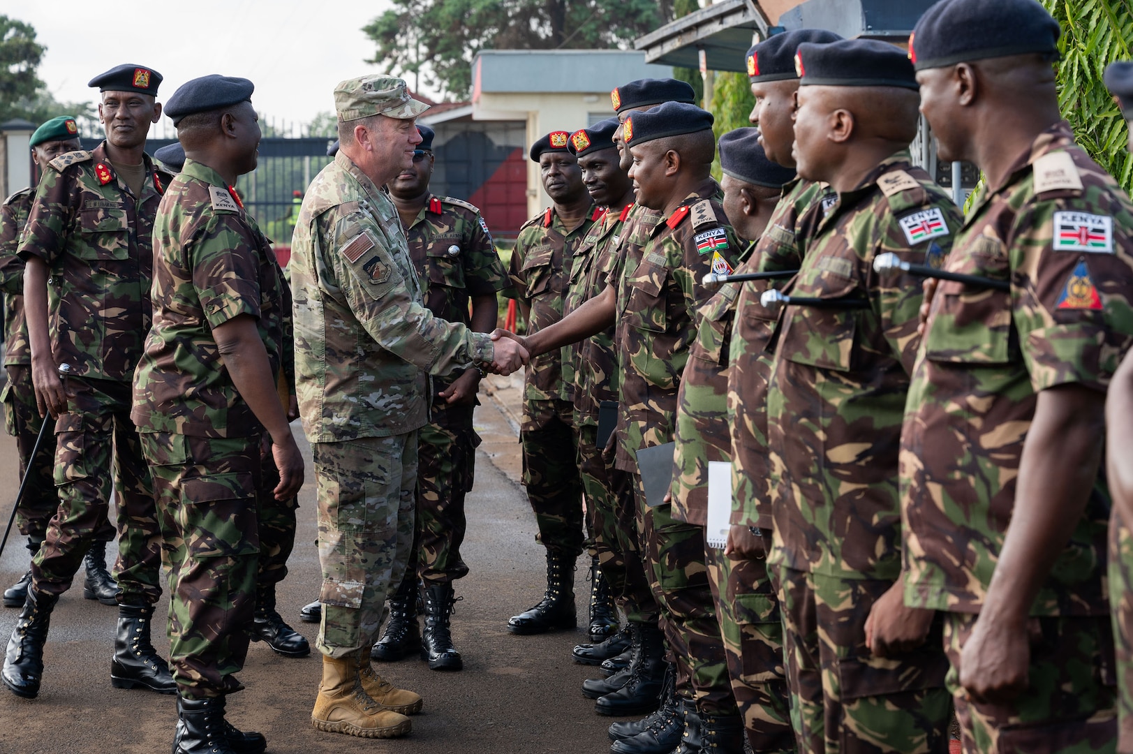U.S. Air Force Maj. Gen. Gary Keefe, the adjutant general of the Massachusetts National Guard, shakes hands with members of the Kenya Defence Forces (KDF) at the Kahawa Barracks in Nairobi, Kenya, May 30, 2025.