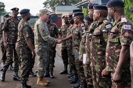 U.S. Air Force Maj. Gen. Gary Keefe, the adjutant general of the Massachusetts National Guard, shakes hands with members of the Kenya Defence Forces (KDF) at the Kahawa Barracks in Nairobi, Kenya, May 30, 2025.