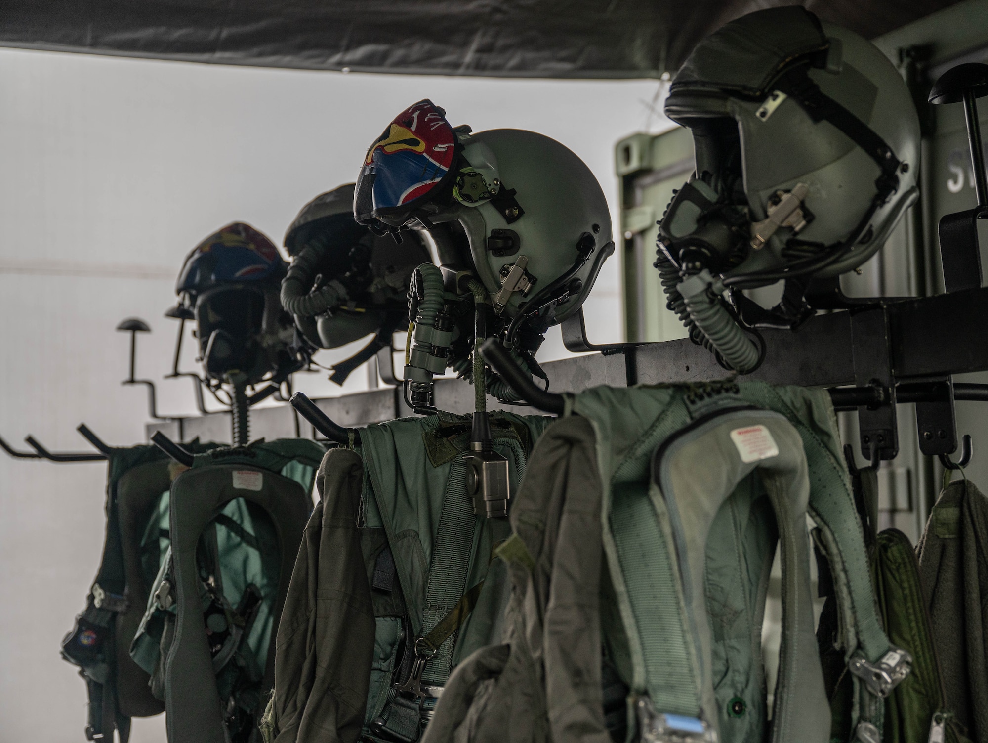 U.S. Air Force F-15E Strike Eagle pilot equipment is prepared during exercise Atlantic Trident 25 at Pirkkala Air base, Finland, June 25, 2025. AT 25 is a recurring multinational training event that allows U.S. Allies to forward-deploy combat power, exercise air-to-air defense in complex environments, and sharpen integration and tactical proficiency. (U.S. Air Force photo by Airman 1st Class Sierra Casteel)