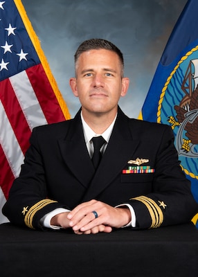 Official portrait of Lt. Cmdr. Christopher J. Wilson. (U.S. Navy photo)