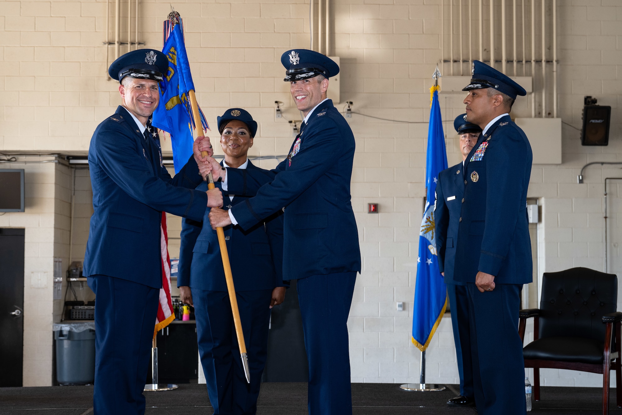 Col. Robert Lance, 7th Mission Support Group outgoing commander, relinquishes command of the 7th MSG during a change of command ceremony at Dyess Air Force Base, Texas, June 26, 2025. During the ceremony, Col. Gregory Savella assumed command of the 7th MSG. (U.S. Air Force photo by Senior Airman Jade M. Caldwell)