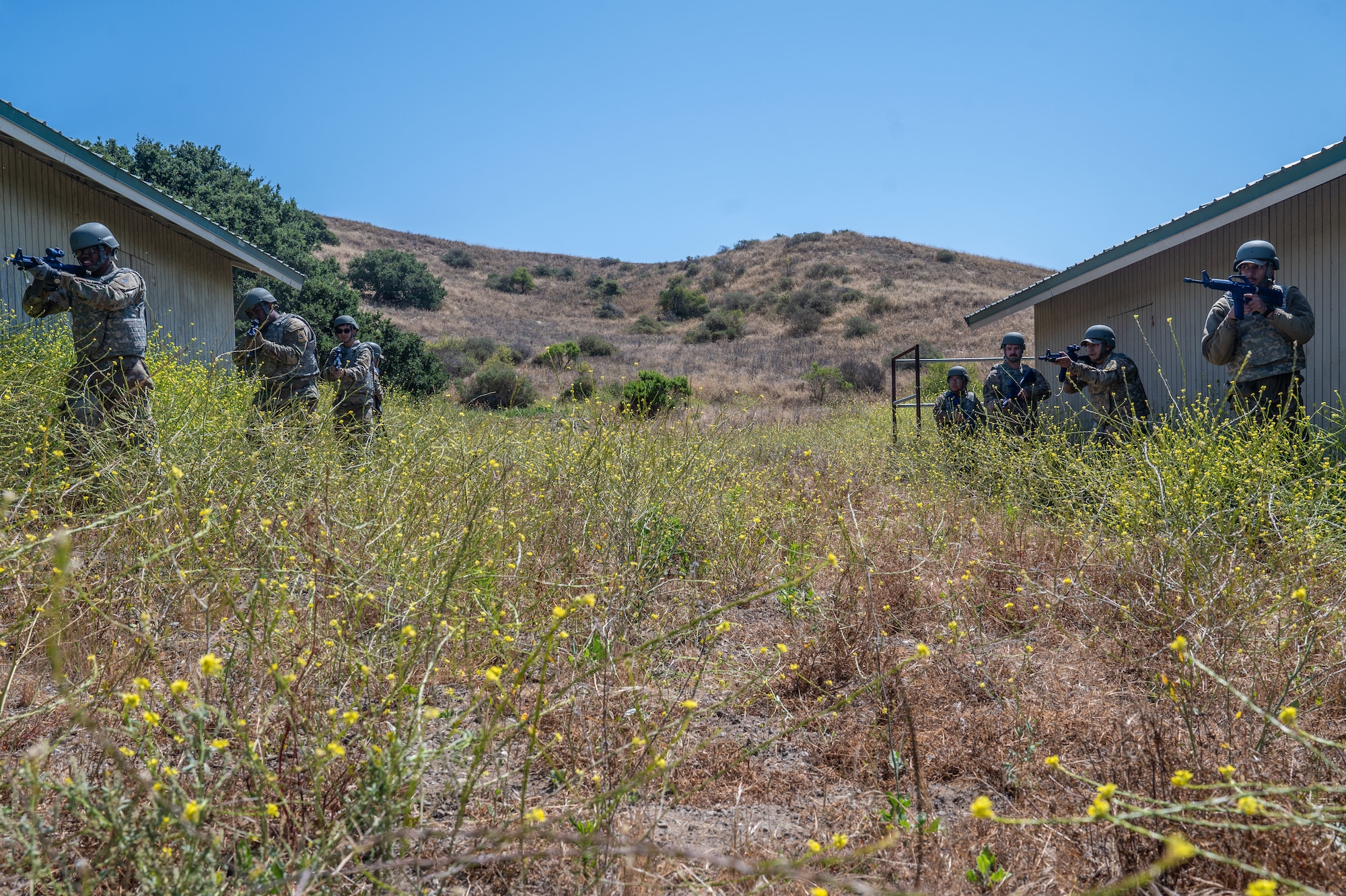 Airmen assigned to the 30th Civil Engineer Squadron perform a tactical march during a simulated event as part of 30 CES’s Prime Base Engineer Emergency Force Day at Vandenberg Space Force Base, Calif., June 26, 2025. During Prime BEEF Day, 30 CES members trained on core civil engineer competencies to ensure deployment readiness.