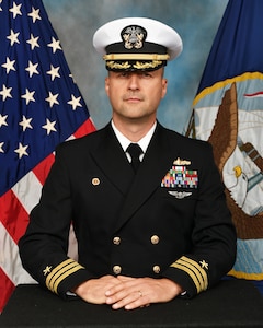 Commander Alban “Al” Dervishi