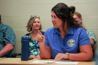 Lila Castellano, a Navy Closure Task Force-Red Hill (NCTF-RH) community liaison officer, briefs members of the Hawaii State Emergency Response Commission on the plan to return the Joint Base Pearl Harbor-Hickam (JBPHH) drinking water system to compliance monitoring and the reactivation of the Navy’s Aiea-Halawa shaft during a meeting in Pearl City, Hawaii, June 20, 2025. Charged with the safe decommissioning of the Red Hill Bulk Fuel Storage Facility (RHBFSF), NCTF-RH was established by the Department of the Navy as a commitment to the community and the environment. NCTF-RH continues to engage with the people of Hawaii, regulatory agencies, and other stakeholders as it safely and deliberately decommissions the facility. (U.S. Navy photo by Mass Communication Specialist 3rd Class Krystal Diaz)