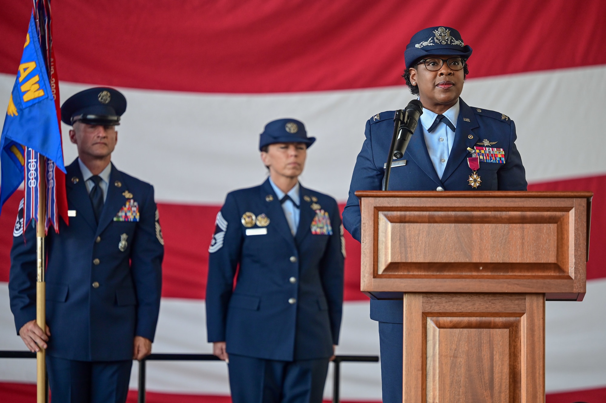 U.S. Air Force Col. N’Keiba Estelle, 19th Mission Support Group outgoing commander, speaks to Team Little Rock members during a change of command ceremony, June 27, 2025, at Little Rock Air Force Base, Arkansas.