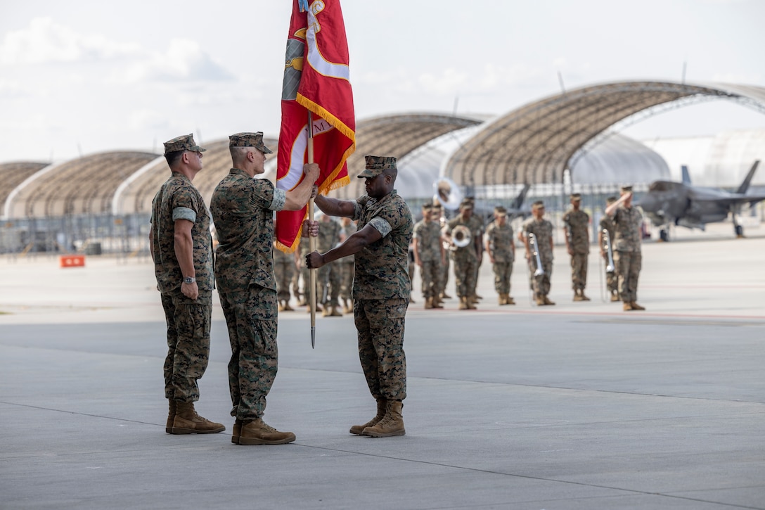 The ceremony represented the squadron's transition from an all-weather F/A-18D Hornet squadron to an F-35B Lightning II squadron and signified the transfer of responsibility, authority, and accountability from Allen to Lt. Col John P. Stuart. (U.S. Marine Corps photo by Lance Cpl. Gavin K. Kulczewski)