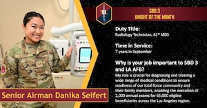 A woman in an Air Force uniform poses with radiology examination equipment as she as recognized for her superior work ethic as July 2025 61st Medical Squadron Knight of the Month.