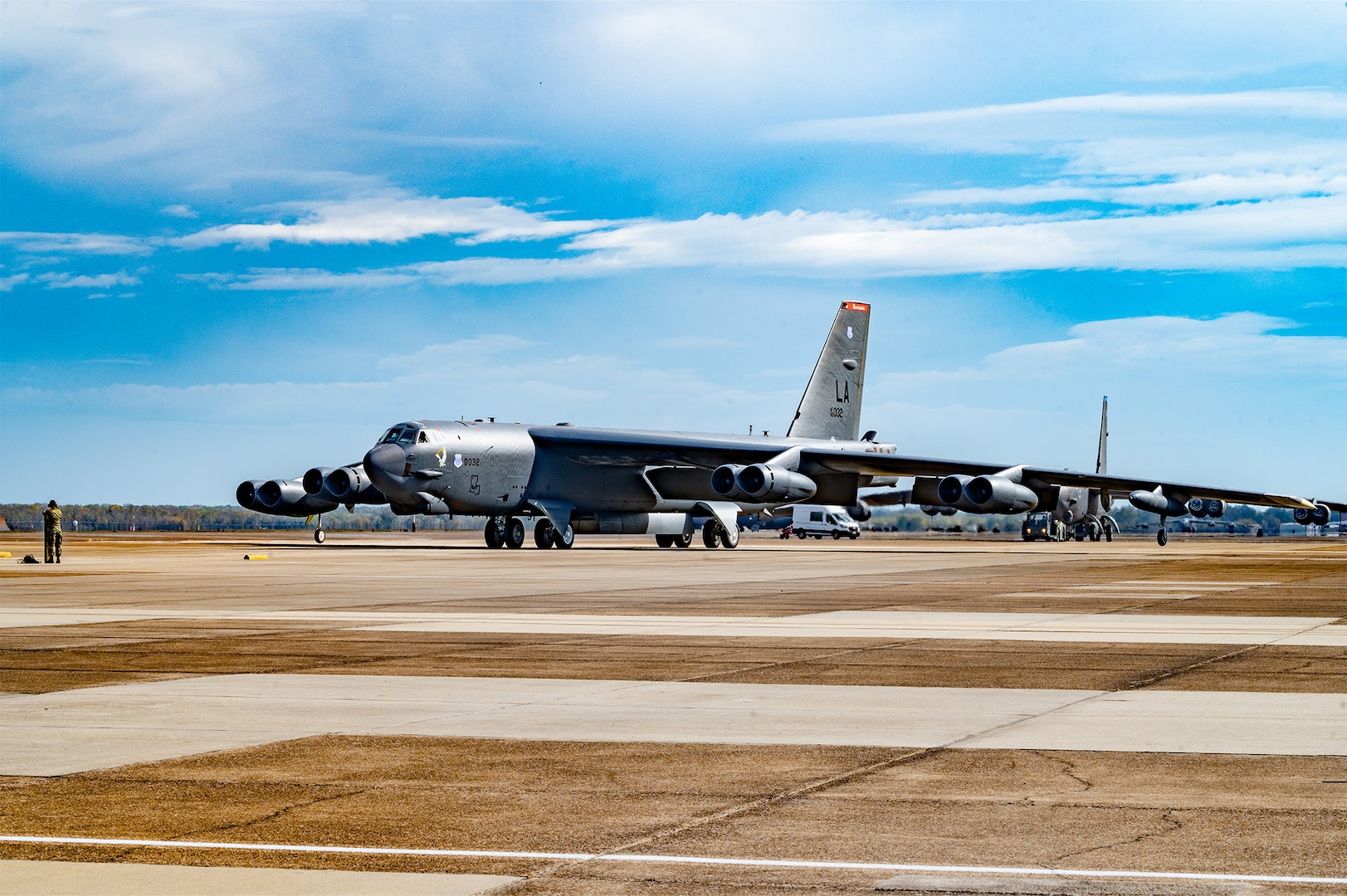 Static B-52 on the runway during the daytime
