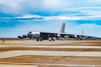 Static B-52 on the runway during the daytime