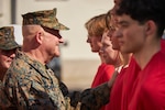 Marine Corps Maj. Gen. Robert B. Sofge Jr., commanding general of Marine Corps Forces Europe and Africa, speaks with recruits assigned to Recruiting Substation Europe after an oath of enlistment ceremony at U.S. Army Garrison Panzer Kaserne, Stuttgart, Germany, May 1, 2025.