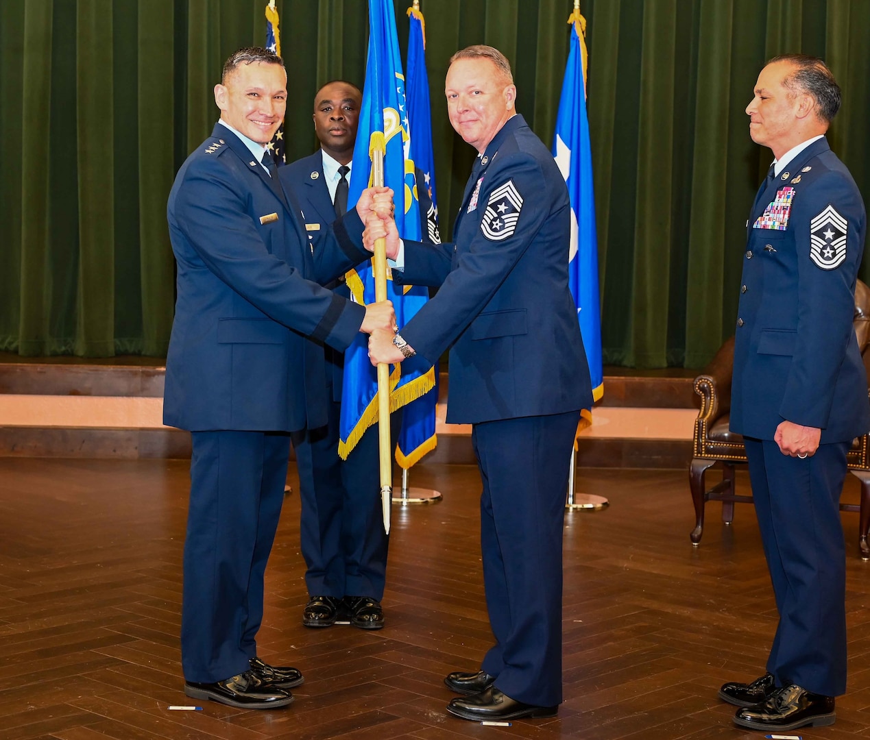 16th AF Commander hands flag to new command chief.