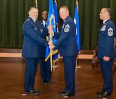 16th AF Commander hands flag to new command chief.