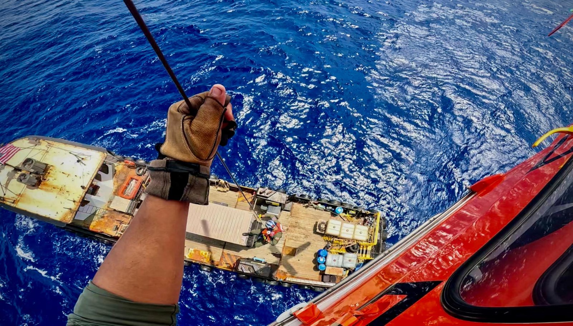 A Coast Guard Air Station Miami aircrew medically evacuates a man from a 100-foot supply vessel approximately 70 nautical miles southeast of Key West, June 28, 2025. The man reportedly sustained an arm injury while aboard the vessel and was transported to Jackson Memorial Hospital for a higher level of care. (U.S. Coast Guard photo by Air Station Miami)