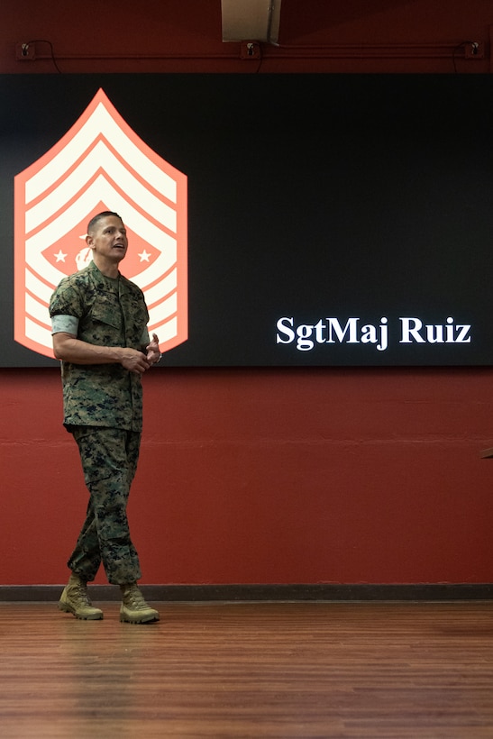 U.S. Marine Corps Sgt. Maj. Carlos A. Ruiz, the 20th Sergeant Major of the Marine Corps, speaks to Marines attending the Sergeants School course at the Staff Noncommissioned Officer Academy on Marine Corps Base Hawaii (MCBH), June 23, 2025. During his visit, Ruiz met with leadership from MCBH, visited the College of Enlisted Military Education - Staff Noncommissioned Officer Academy, conducted a barracks walkthrough, toured the MCBH Individual Issue Facility (IIF), and spoke at an all-hands town hall. Ruiz visited MCBH to gain a better understanding of current operations. (U.S. Marine Corps photo by Lance Cpl. Tania Guerrero)
