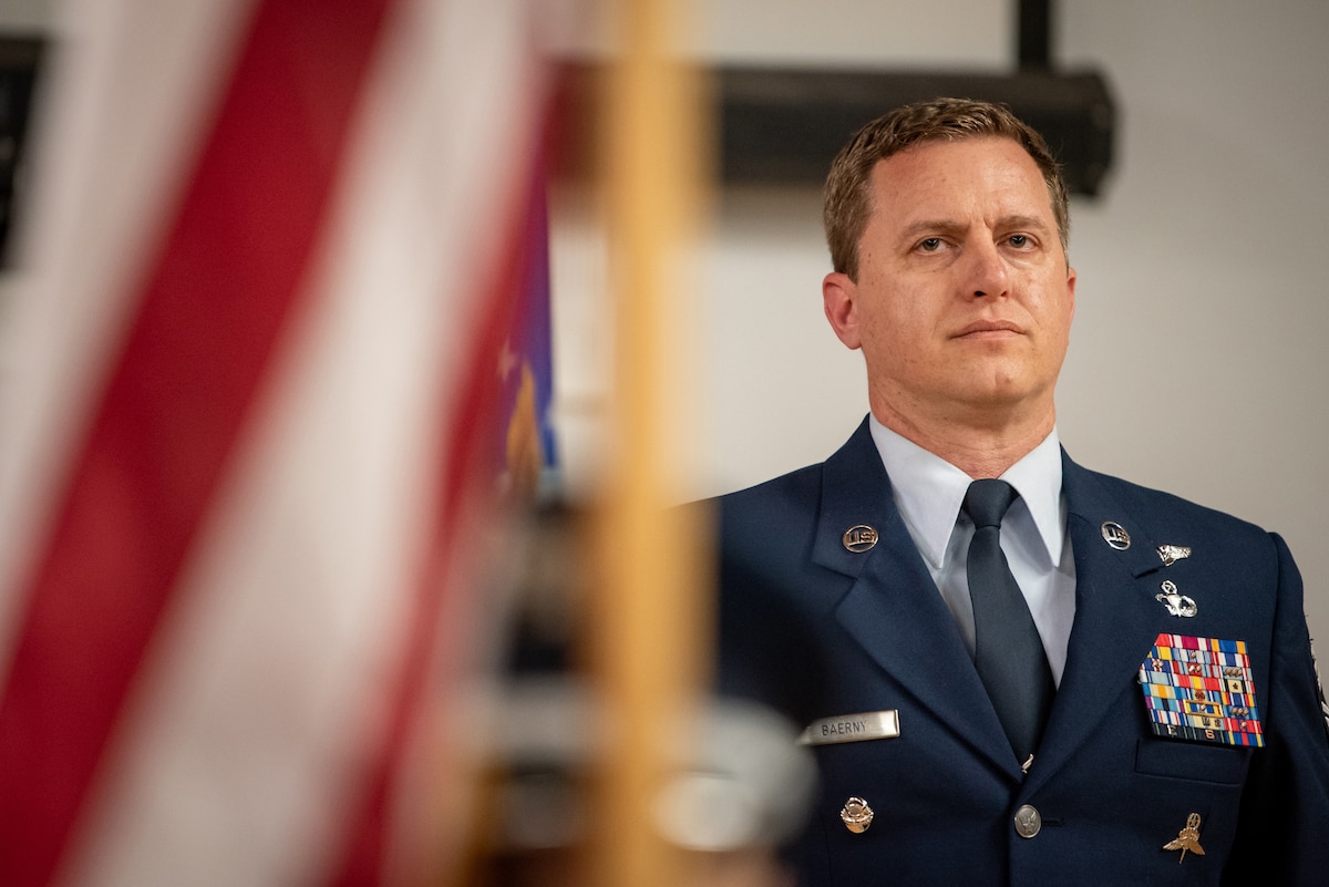 Chief Master Sgt. Blair Baerny, the newly appointed command chief for the 123rd Airlift Wing, speaks during a change-of-responsibility ceremony at the Kentucky Air National Guard Base in Louisville Ky, April 13, 2025. Baerny replaces Chief Master Sgt. Steven Best , who was named state command chief for the Kentucky Air National Guard. (U.S. Air National Guard photo by Master Sgt. Joshua Horton)