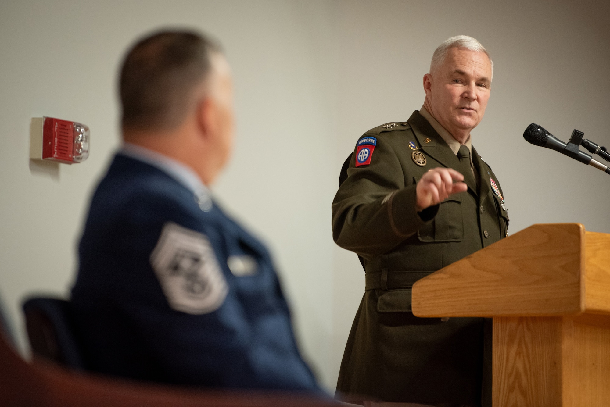 Kentucky’s adjutant general, U.S. Army Maj. Gen. Haldane Lamberton, right, speaks during a retirement ceremony for Chief Master Sgt. James Tongate, left, Kentucky Air National Guard state command chief, at the Kentucky Air National Guard Base in Louisville, Ky., April 13, 2025. Tongate served the U.S. military for 33 years. (U.S. Air National Guard photo by Master Sgt. Joshua Horton)