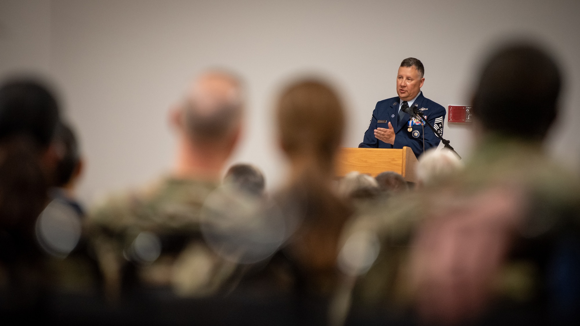 Chief Master Sgt. James Tongate, Kentucky Air National Guard state command chief, speaks during his retirement ceremony at the Kentucky Air National Guard Base in Louisville, Ky., April 13, 2025. Tongate served the U.S. military for 33 years. (U.S. Air National Guard photo by Master Sgt. Joshua Horton)