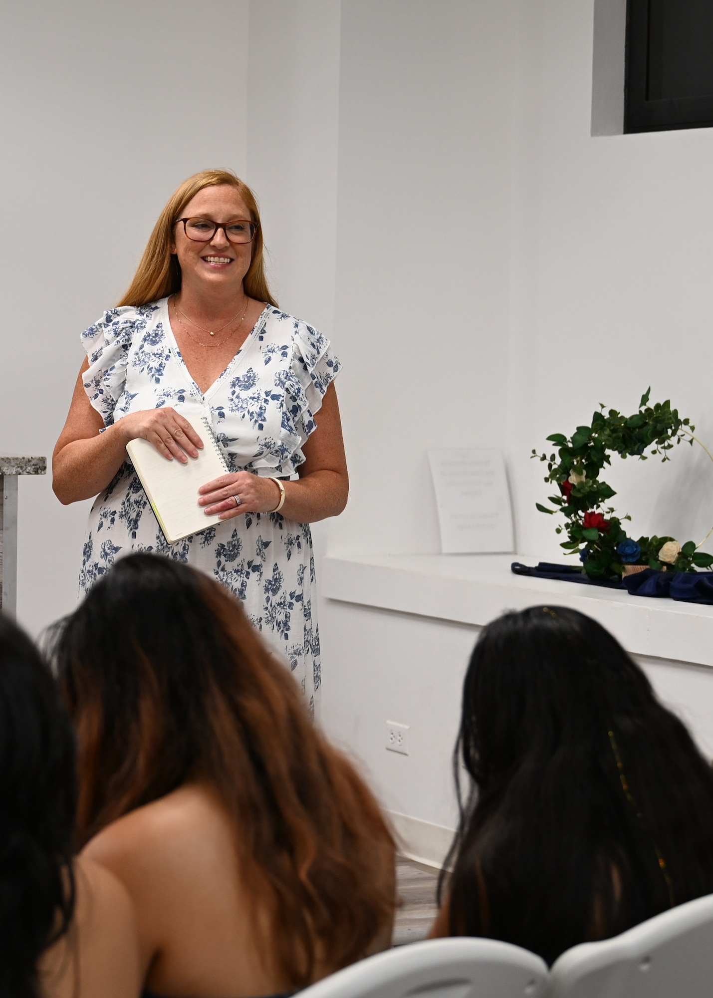 U.S. Air Force Ret. Col. Melchizedek “Kato” Martinez speaks to members of Team Andersen Spouses’ Club at Andersen Air Force Base, Guam, June 26, 2025. The gathering was to honor the memory of a former member of TASC, Gail Minglana Martinez. (U.S. Air Force photo by Senior Airman Audree Campbell)