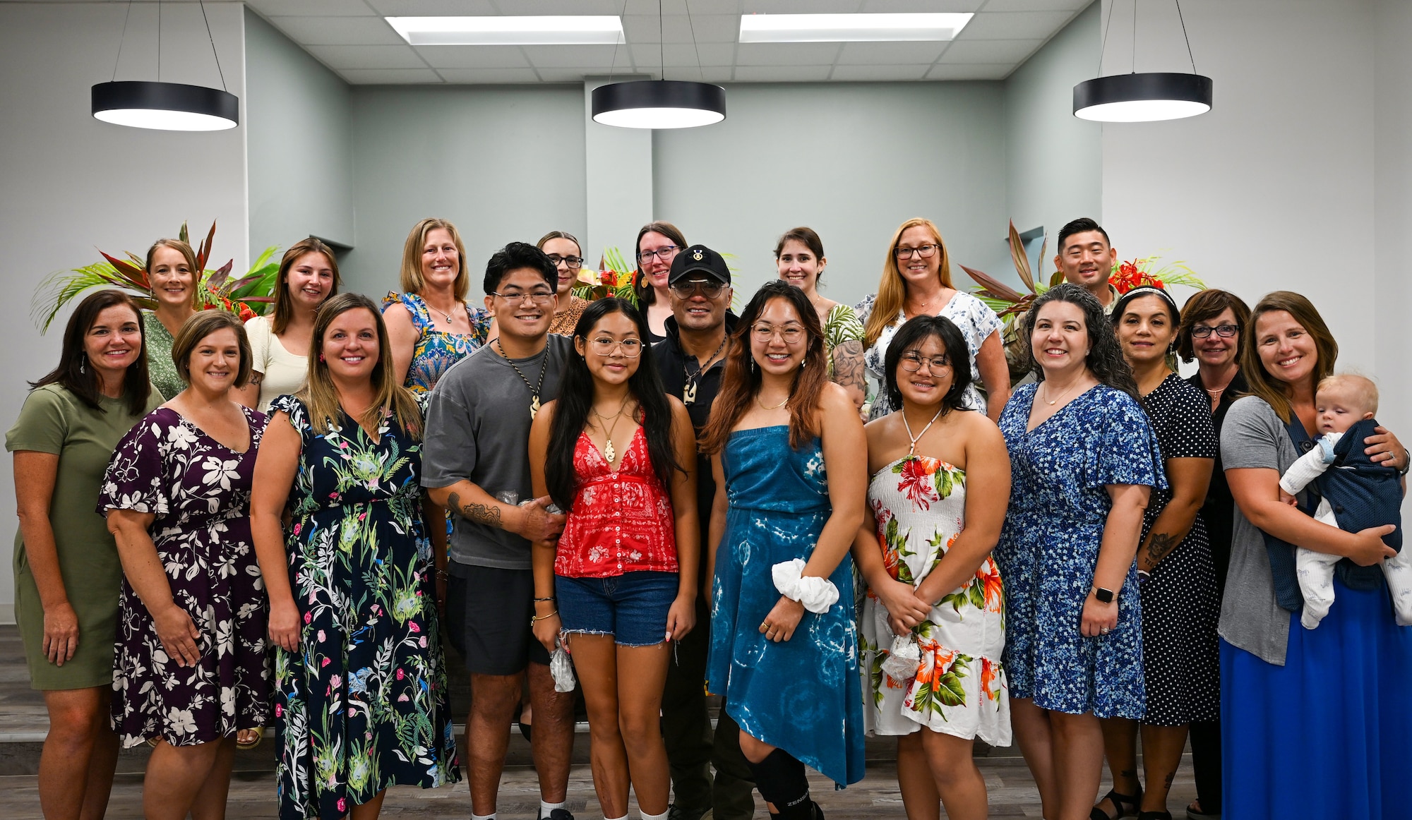 U.S. Air Force Ret. Col. Melchizedek “Kato” Martinez speaks to members of Team Andersen Spouses’ Club at Andersen Air Force Base, Guam, June 26, 2025. The gathering was to honor the memory of a former member of TASC, Gail Minglana Martinez. (U.S. Air Force photo by Senior Airman Audree Campbell)