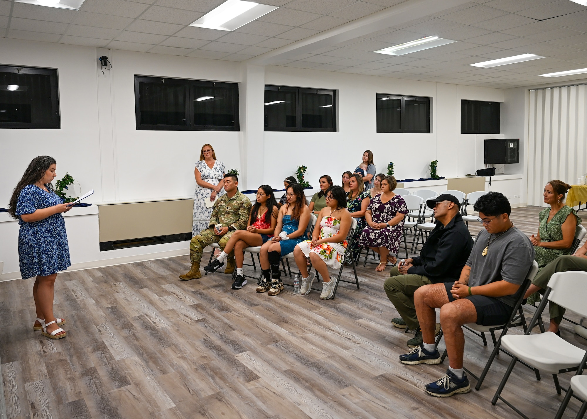 U.S. Air Force Ret. Col. Melchizedek “Kato” Martinez speaks to members of Team Andersen Spouses’ Club at Andersen Air Force Base, Guam, June 26, 2025. The gathering was to honor the memory of a former member of TASC, Gail Minglana Martinez. (U.S. Air Force photo by Senior Airman Audree Campbell)