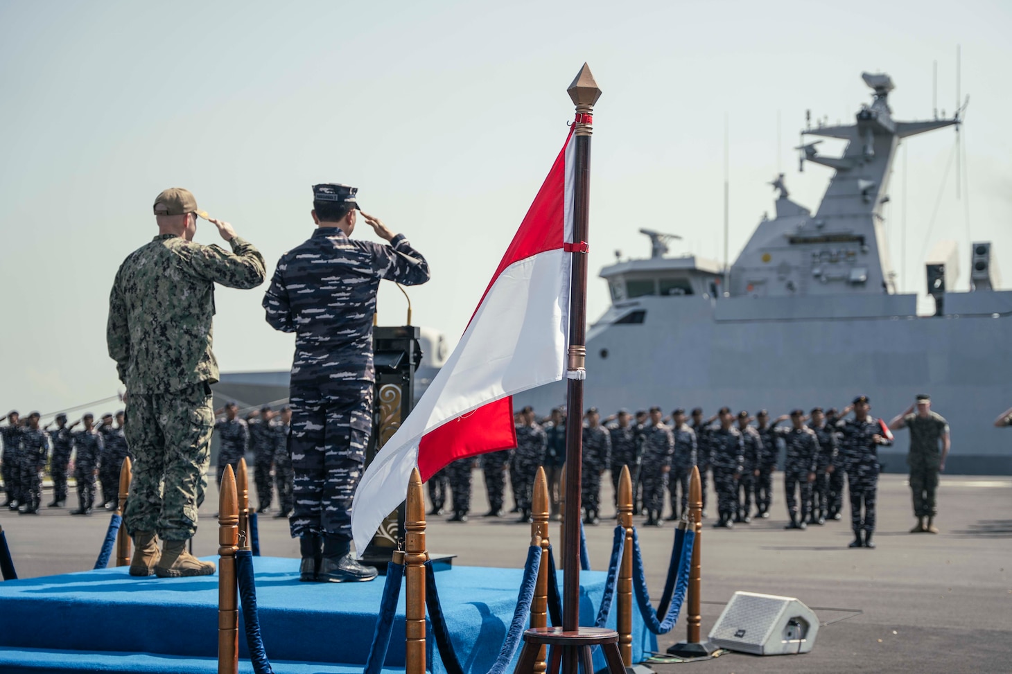250623-N-CM740-1397 SURABAYA, Indonesia (June 23, 2025) - U.S. Navy Capt. Matt Scarlett, commodore, Destroyer Squadron Seven, left, and Rear Adm. I Gung Putu Alit Jaya, commander in chief, 2nd Fleet, Indonesian Navy, participate in the opening ceremony of Cooperation Afloat Readiness and Training (CARAT) Indonesia 2025 at Tentara Nasional Indonesia Angkatan Laut (TNI-AL) headquarters in Surabaya, Indonesia, June 23, 2025. CARAT Indonesia is a bilateral exercise between Indonesia and the United States designed to promote regional security cooperation, maintain and strengthen maritime partnerships, and enhance U.S. and partner navies’ abilities to operate together in response to maritime security challenges in the Indo-Pacific region (U.S. Navy photo by Mass Communication Specialist 1st Class Robert Stamer)