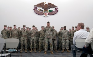 Lt. Col. Nicholas Rhodes (center) stands in front of a formation of Airmen during a demobilization ceremony in Warrenton, Oregon on 8 June, 2025. 34 Members of the 116th Air Control Squadron deployed in the fall of 2024 in support of United States Central Command.