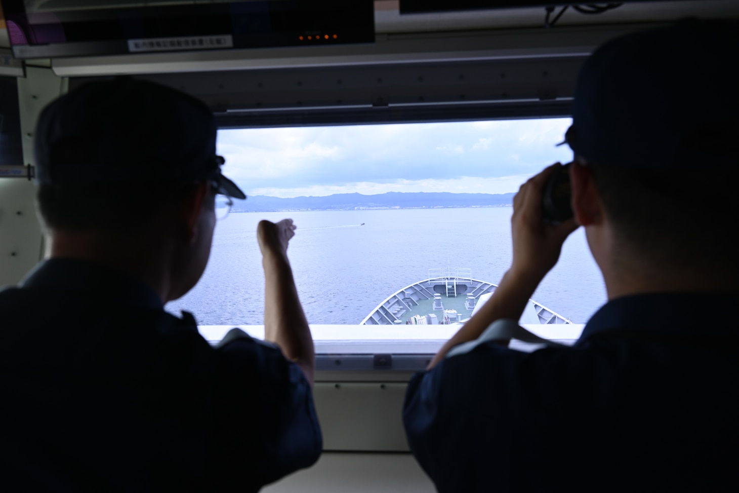 Japan Coast Guard members aboard the Japan Coast Guard Patrol Vessel Asanagi (PLH-43) identify an oscar mannequin in the water during a trilateral search and rescue exercise with the Japan and Philippine Coast Guards and the Legend-class U.S. Coast Guard Cutter Stratton (WMSL 752) in Kagoshima, Japan, June 20, 2025. Stratton is deployed and assigned to Destroyer Squadron (DESRON) 15, the Navy’s largest DESRON and the U.S. 7th Fleet’s principal surface force. U.S. Coast Guard Cutter Stratton is deployed to the Indo-Pacific to advance relationships with ally and partner nations to build a more secure and prosperous region with unrestricted, lawful access to the maritime commons. (U.S. Coast Guard photo by Senior Chief Petty Officer Matthew S. Masaschi)