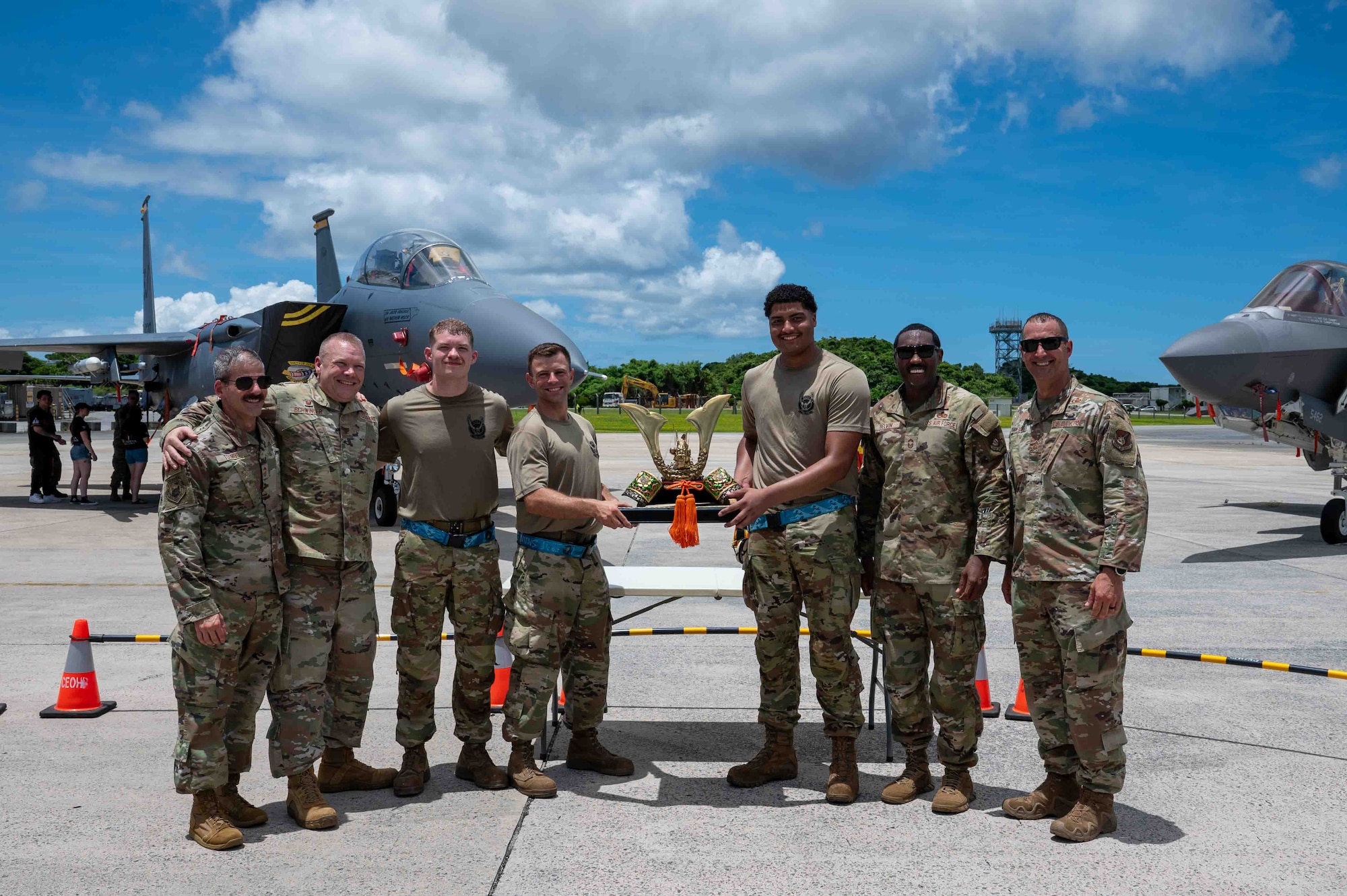 service members pose for a photo