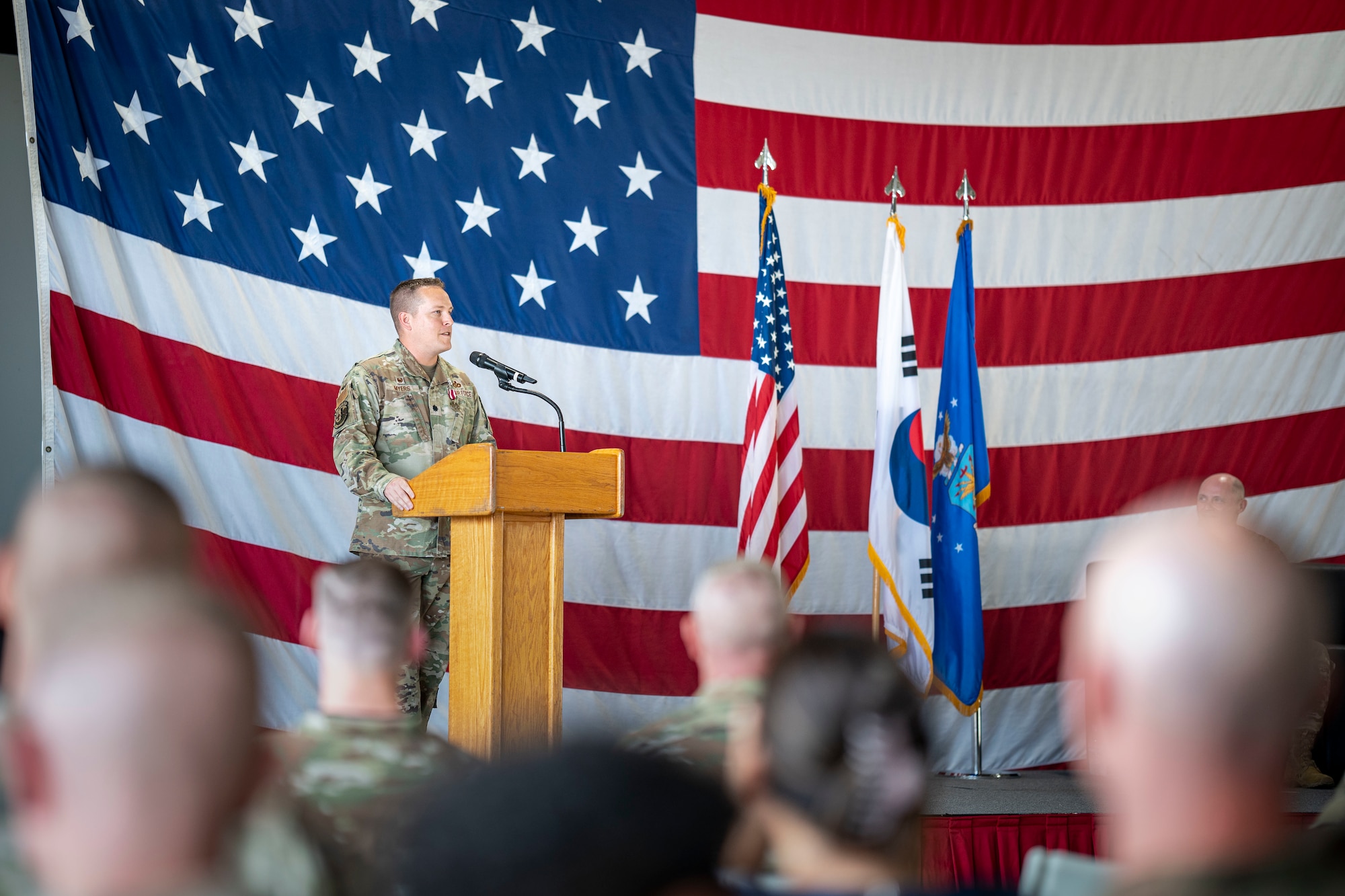U.S. Air Force Lt. Col. Andrew Myers, outgoing 51st Civil Engineering Squadron commander, delivers farewell remarks during a Change of Command ceremony at Osan Air Base, Republic of Korea, June 30, 2025.