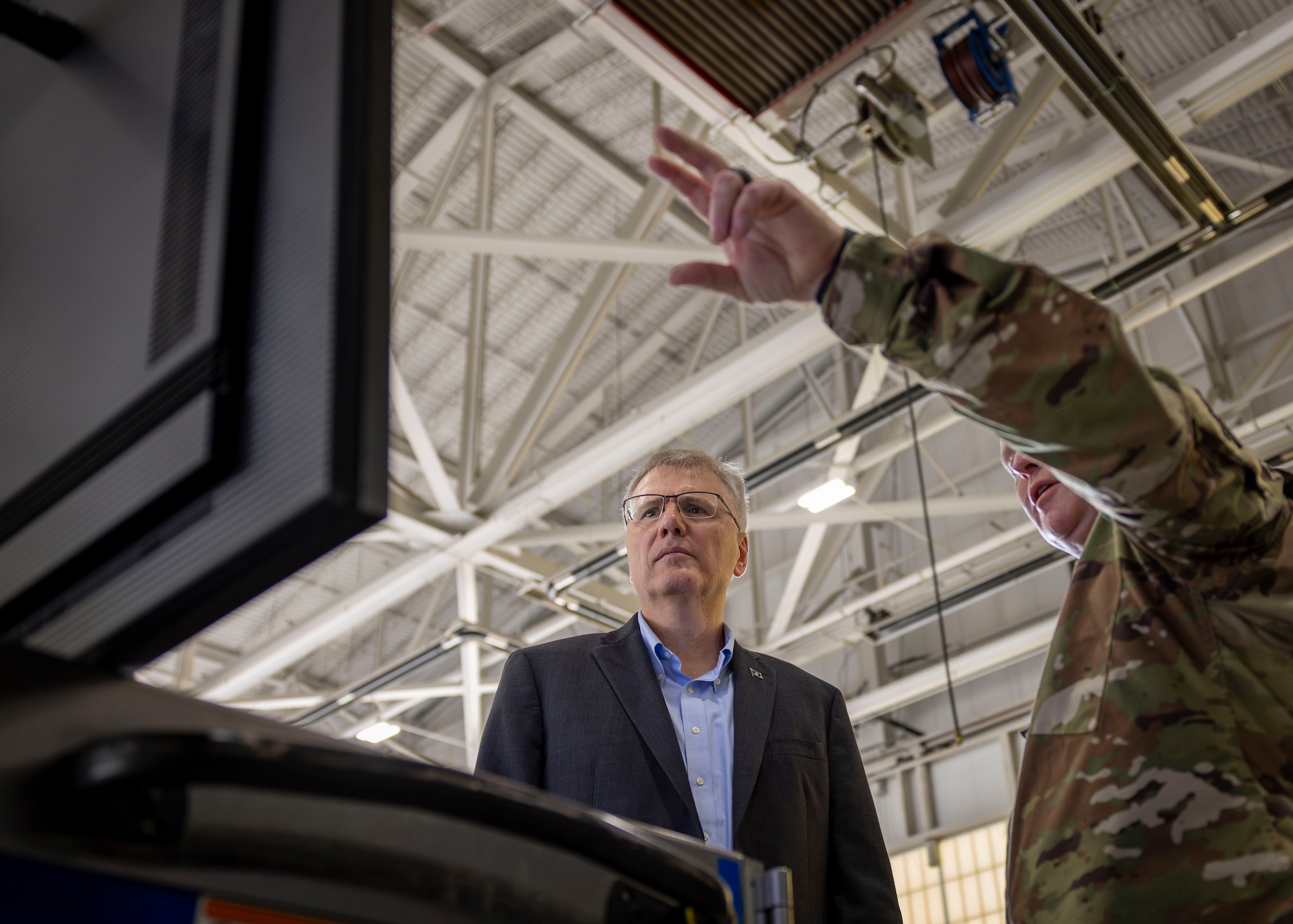 The Secretary of the Air Force speaks with Airmen on his Air Combat Command immersion tour.