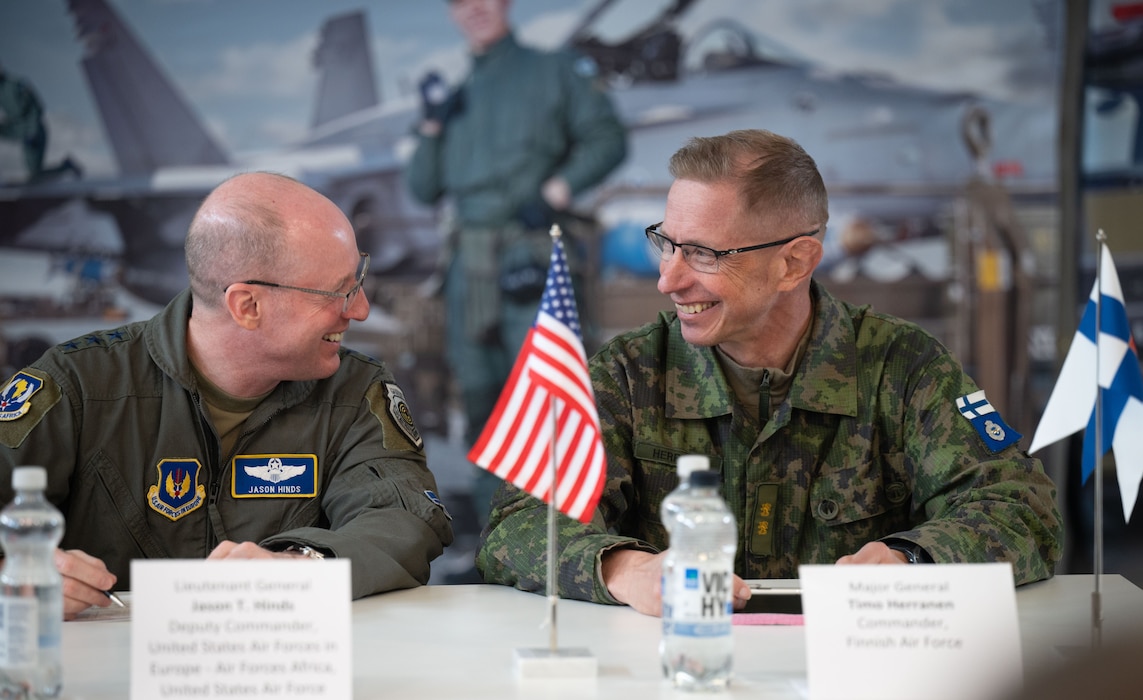 U.S. Air Force Lt. Gen. Jason Hinds, left, U.S. Air Forces in Europe - Air Forces Africa deputy commander, attends a press conference alongside Finnish Air Force Maj. Gen. Timo Herranen, Commander of the Finnish Air Force, during exercise Atlantic Trident 25 at Pirkkala Air Base, Finland, June 26, 2025. The leaders discussed the exercise's mission to build military capabilities and warfighting capacity between the U.S., U.K., France and Finland, to support deterrence and defense of the Euro-Atlantic region, ensuring continued readiness, adaptability and lethality. (U.S. Air Force photo by Senior Airman Ashley Talley)