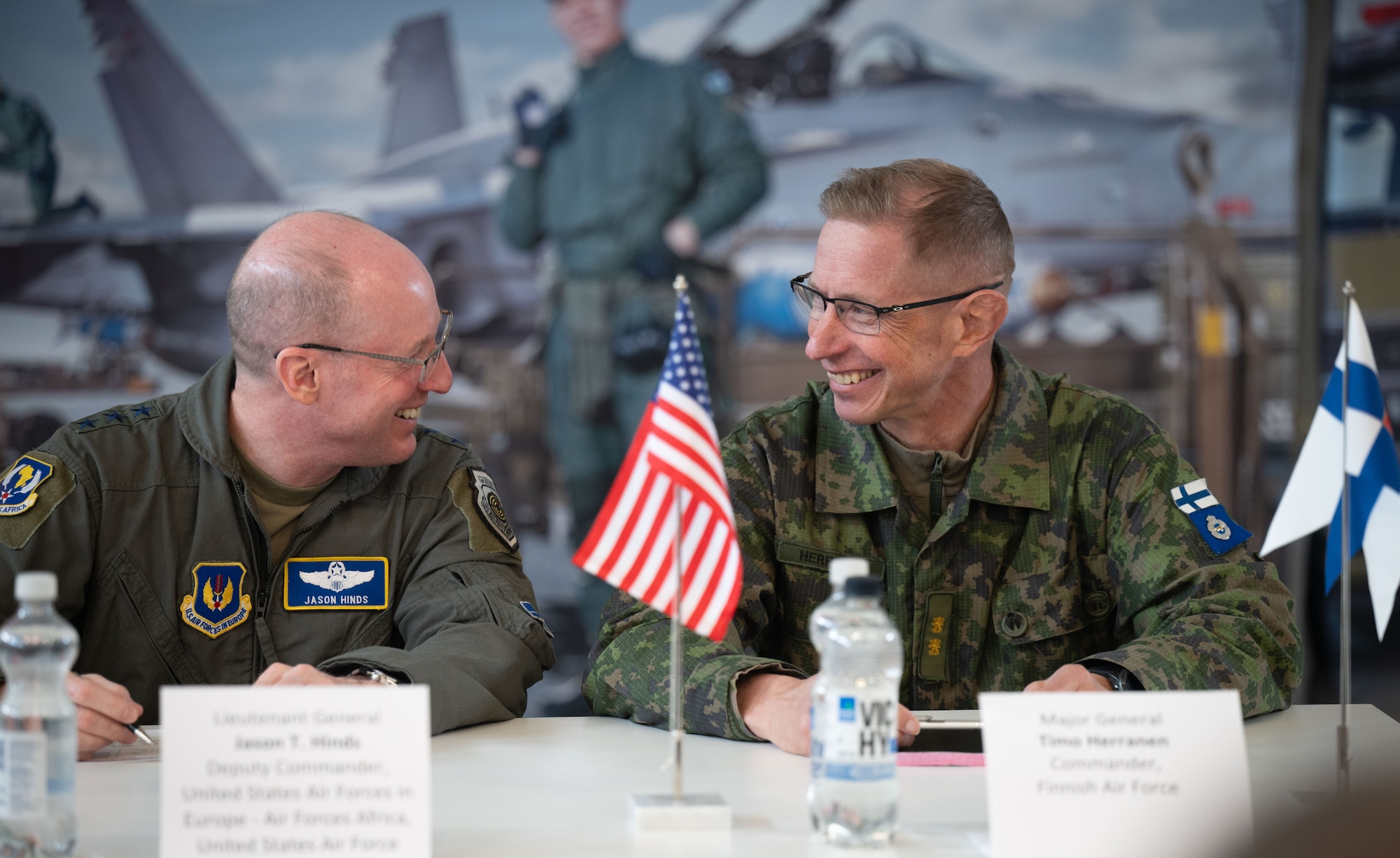 U.S. Air Force Lt. Gen. Jason Hinds, left, U.S. Air Forces in Europe - Air Forces Africa deputy commander, attends a press conference alongside Finnish Air Force Maj. Gen. Timo Herranen, Commander of the Finnish Air Force, during exercise Atlantic Trident 25 at Pirkkala Air Base, Finland, June 26, 2025. The leaders discussed the exercise's mission to build military capabilities and warfighting capacity between the U.S., U.K., France and Finland, to support deterrence and defense of the Euro-Atlantic region, ensuring continued readiness, adaptability and lethality. (U.S. Air Force photo by Senior Airman Ashley Talley)