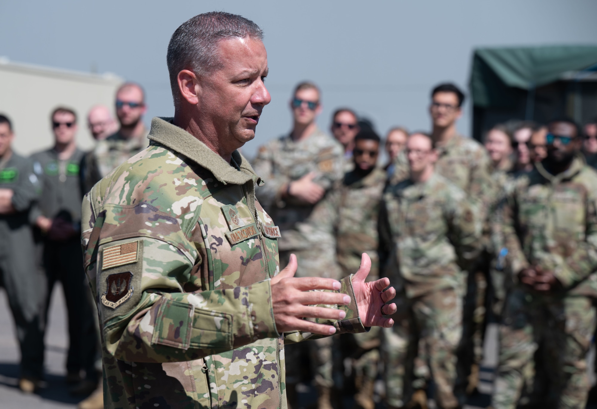 U.S. Air Force Chief Master Sgt. Randy Kwiatkowski, U.S. Air Forces in Europe - Air Forces Africa command chief, addresses 48th Fighter Wing Airmen during exercise Atlantic Trident 25 at Pirkkala Air Base, Finland, June 26, 2025. AT 25 is designed to increase the U.S. and Allies’ power, lethality and flexibility, edging strategic coalition deterrence. (U.S. Air Force photo by Senior Airman Ashley Talley)