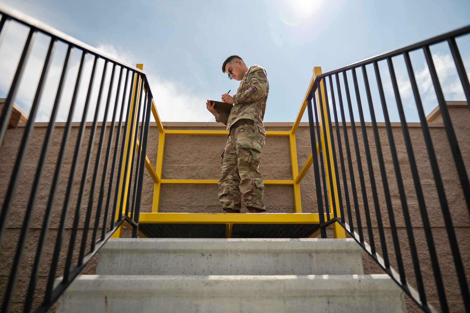 U.S. Air Force Airman 1st Class James Kenhi Sison, 92nd Operational Support Squadron weather technician, conducts an hourly weather check at Fairchild Air Force Base, Washington, June 26, 2025. Hourly weather checks ensure the safety and effectiveness of base missions by providing timely and accurate information. (U.S. Air Force photo by Senior Airman Morgan St Marks)
