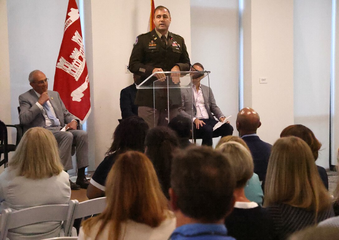 Man at podium giving a speech.