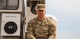U.S. Army 1st Lt. Bryan Albertson, the executive officer assigned to 333rd Engineer Company, 365th Engineer Battalion, 302nd Maneuver Enhancement Brigade, 412th Engineer Command, sits atop an Altec AC38-127S-EJ 38-Ton Boom on the road construction project between U.S. and Mongolian forces, during Khaan Quest 2025, at Five Hills Training Area in Mongolia, on June 24, 2025. Khaan Quest is an annual, multinational and multicomponent training exercise led by the Mongolian Armed Forces designed to promote regional peace and security. (U.S. Army photo by Capt. Anthony Kapelka)