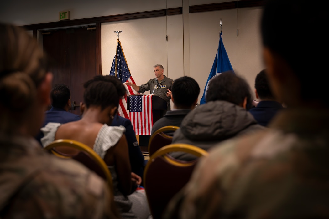 Group commander speaks at event