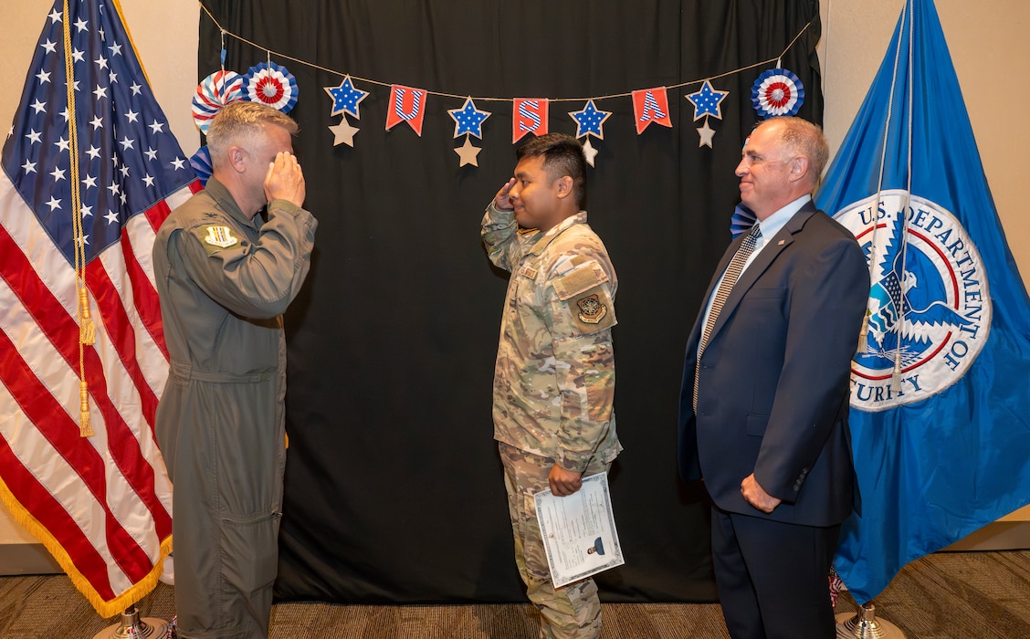 Airman salutes group commander