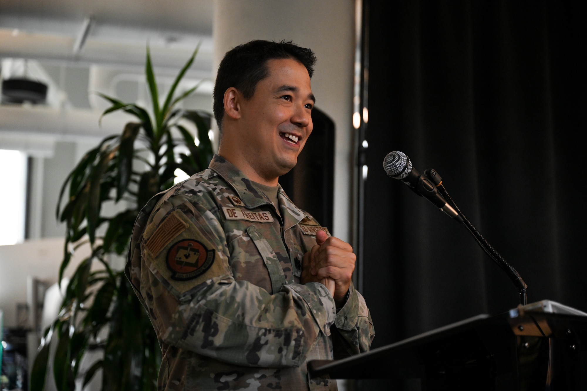 U.S. Air Force Lt. Col. Adrian De Freitas, 563d Electronic Warfare Squadron commander, gives his remarks after taking command during a change of command ceremony in San Antonio, Texas, June 30, 2025. This is the unit’s second change of command since reactivating in 2024 as a software development unit under the 350th Spectrum Warfare Wing. (U.S. Air Force photo by Capt. Benjamin Aronson)